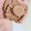 LUU KIDS-SMOCZEK 3-6M MILK HAZELNUT