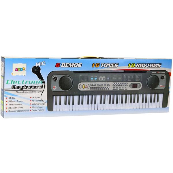 Keyboard z mikrofonem, stojakiem i nutami